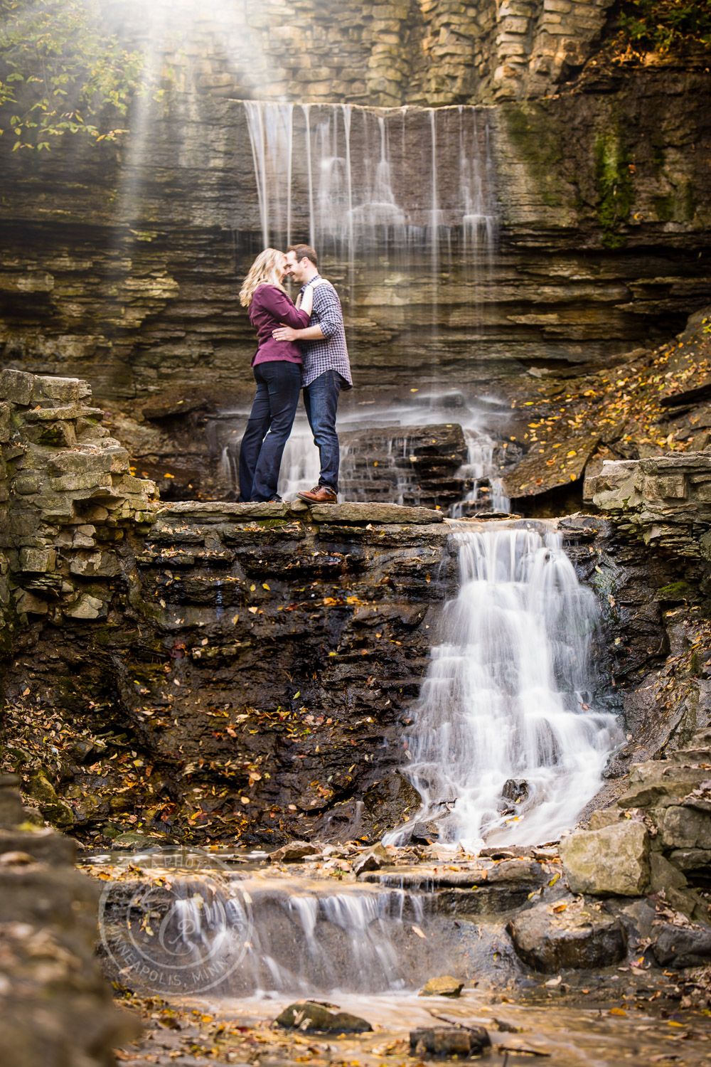 Hidden Falls Waterfall St Paul MN Engaged Couple