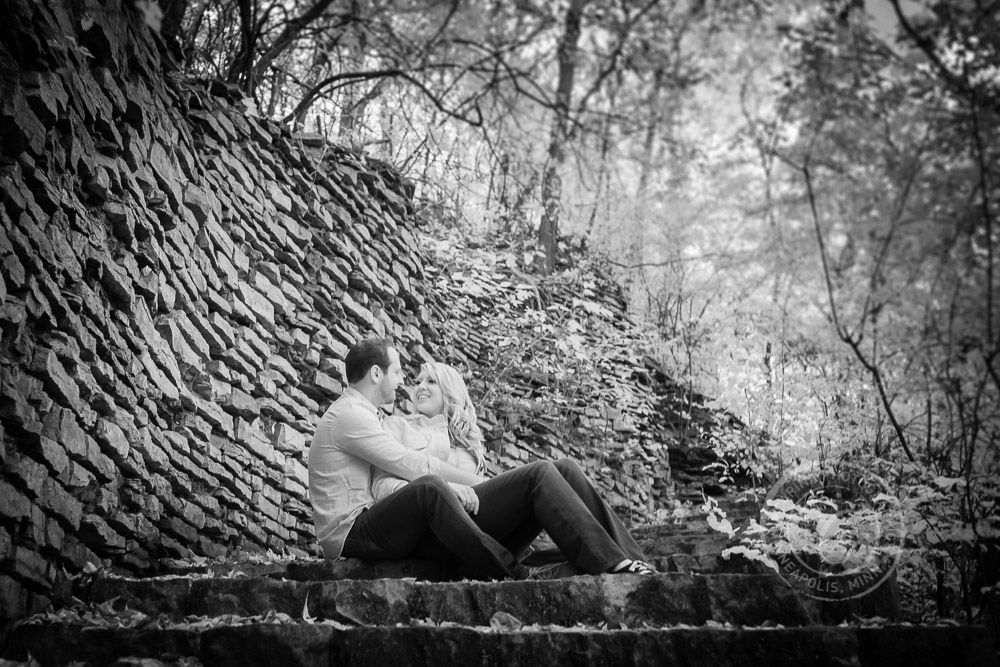 Hidden Falls Stone Wall St Paul MN Engaged Couple